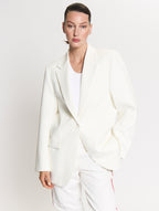 Detail of model wearing the Blazer in Off White and the Tanktop body in White