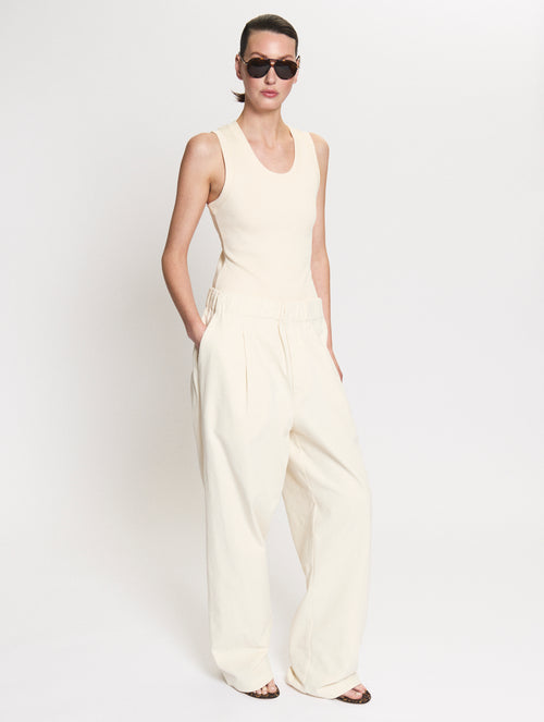Model wearing Tanktop body in Oat and Utility pants in Off White 