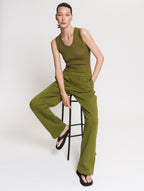Model wearing the Tanktop body in Olive and the Jogger in Pear