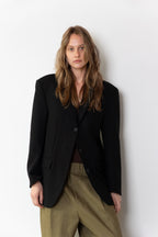 Detail of model wearing the original Blazer in black in size 36