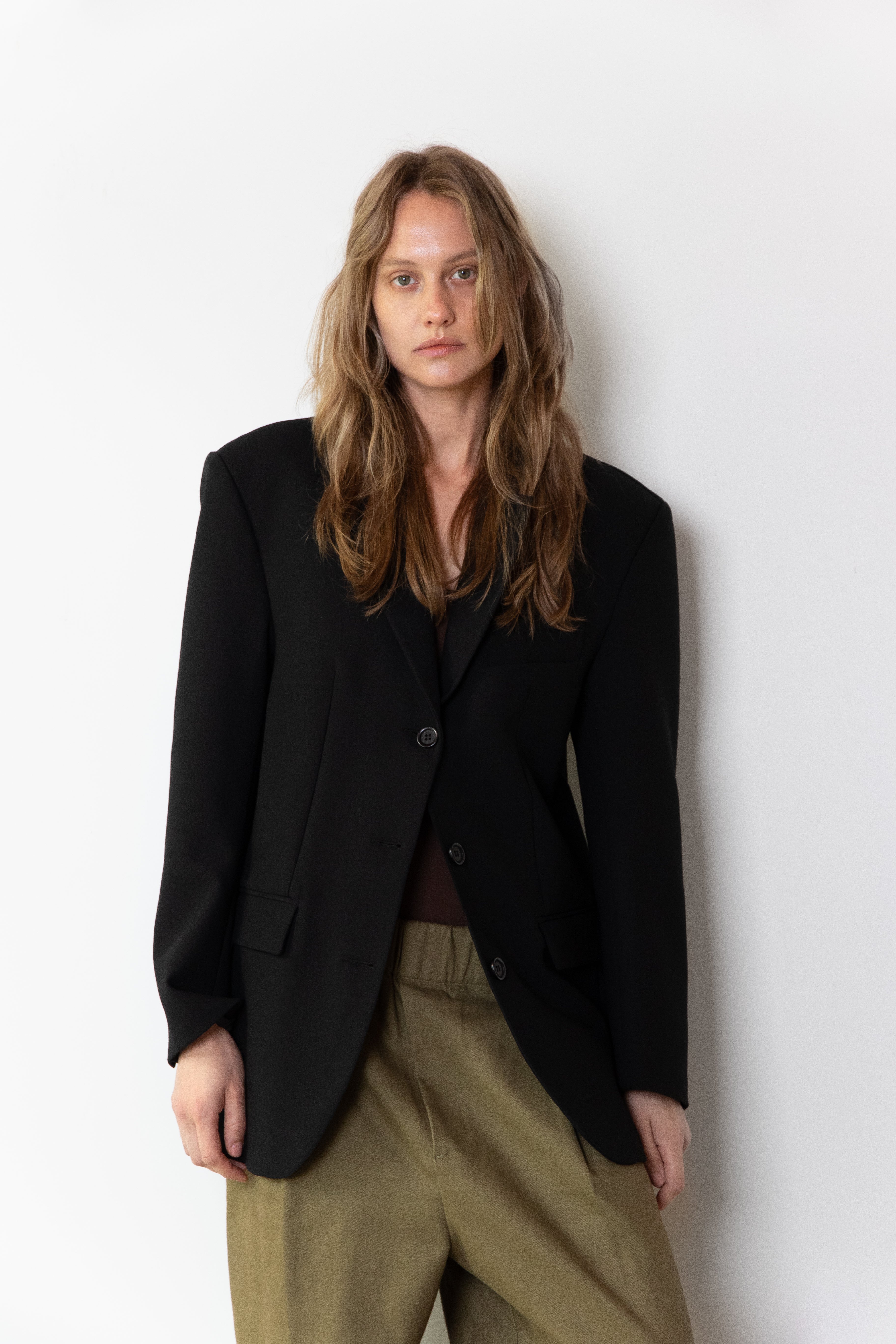 Detail of model wearing the original Blazer in black in size 36