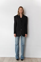 Model wearing the original Blazer in black in size 34 